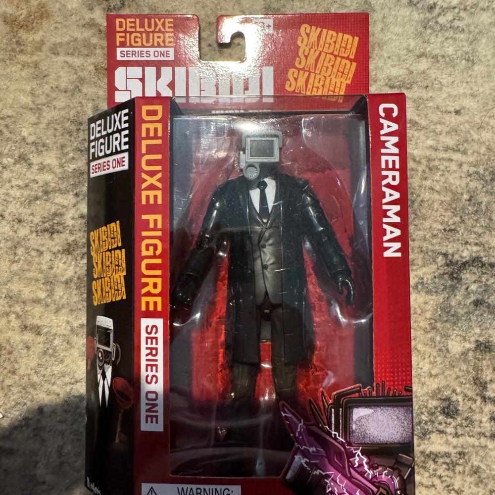 Skibidi Cameraman Deluxe Figure